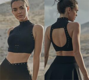 Look elegant and perform at your best with the Women’s High Neck Yoga Top & Tennis Skirt Outfit. This 2-piece activewear set features a high-neck yoga top that provides light to medium support with full coverage, perfect for yoga, tennis, or casual fitness activities. The matching tennis skirt offers a flattering A-line silhouette with built-in shorts for comfort, freedom of movement, and extra coverage. Made from soft, breathable, and stretchable fabric, this set ensures all-day comfort while keeping you cool and confident. Ideal for workouts, outdoor sports, or casual athleisure wear, this outfit delivers style, performance, and versatility in one set. Features: High-neck yoga top for support and coverage Tennis skirt with built-in shorts for freedom of movement Soft, breathable, and stretchable performance fabric Moisture-wicking and quick-drying design Ideal for yoga, tennis, fitness, or casual wear Comes as a coordinated 2-piece set