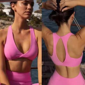 Experience style and comfort with the Women’s Racerback Sports Bra & High-Waist Hollow Breathable Yoga Shorts. This chic 2-piece activewear set includes a racerback sports bra that provides medium support and a snug fit, perfect for yoga, pilates, or gym workouts. The hollow mesh design enhances airflow, keeping you cool and comfortable even during intense sessions. The high-waist yoga shorts are crafted from seamless, stretchable fabric that sculpts your body and allows full freedom of movement. Designed for performance and aesthetics, this set is ideal for both training and athleisure wear — helping you look and feel your best. Features: Racerback sports bra with breathable hollow design High-waist yoga shorts for a flattering, secure fit Seamless, quick-dry, and moisture-wicking fabric Soft, flexible, and ultra-lightweight for all-day comfort Ideal for yoga, gym, running, or casual wear Comes as a coordinated 2-piece set