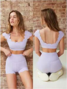 Step into elegance and confidence with the Elegant Scallop Edge Top – Wide Shoulder Straps, a perfect blend of style, comfort, and functionality. This beautifully designed top features a delicate scallop edge neckline and wide shoulder straps that provide superior comfort and a secure fit during any activity. Made from high-stretch, breathable, and moisture-wicking fabric, it ensures maximum comfort whether you’re working out, doing yoga, or styling it for a casual day out. Its minimalist yet chic design makes it a versatile addition to your wardrobe — ideal for both fitness and lifestyle wear. Features: Elegant scallop edge neckline for a refined feminine touch Wide shoulder straps for stability and comfort Soft, stretchable, and quick-dry fabric Seamless design that flatters your shape Perfect for yoga, pilates, gym, or casual wear Easy to pair with leggings, skirts, or jeans